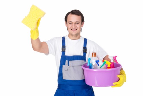 Local carpet cleaning service treating stains in a NW5 flat hallway